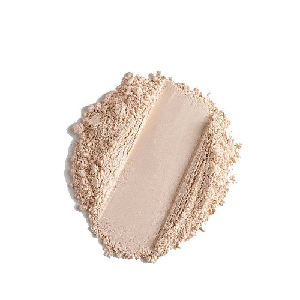 Light beige loose face powder by NOTE, finely milled with soft texture, top-down view on white background