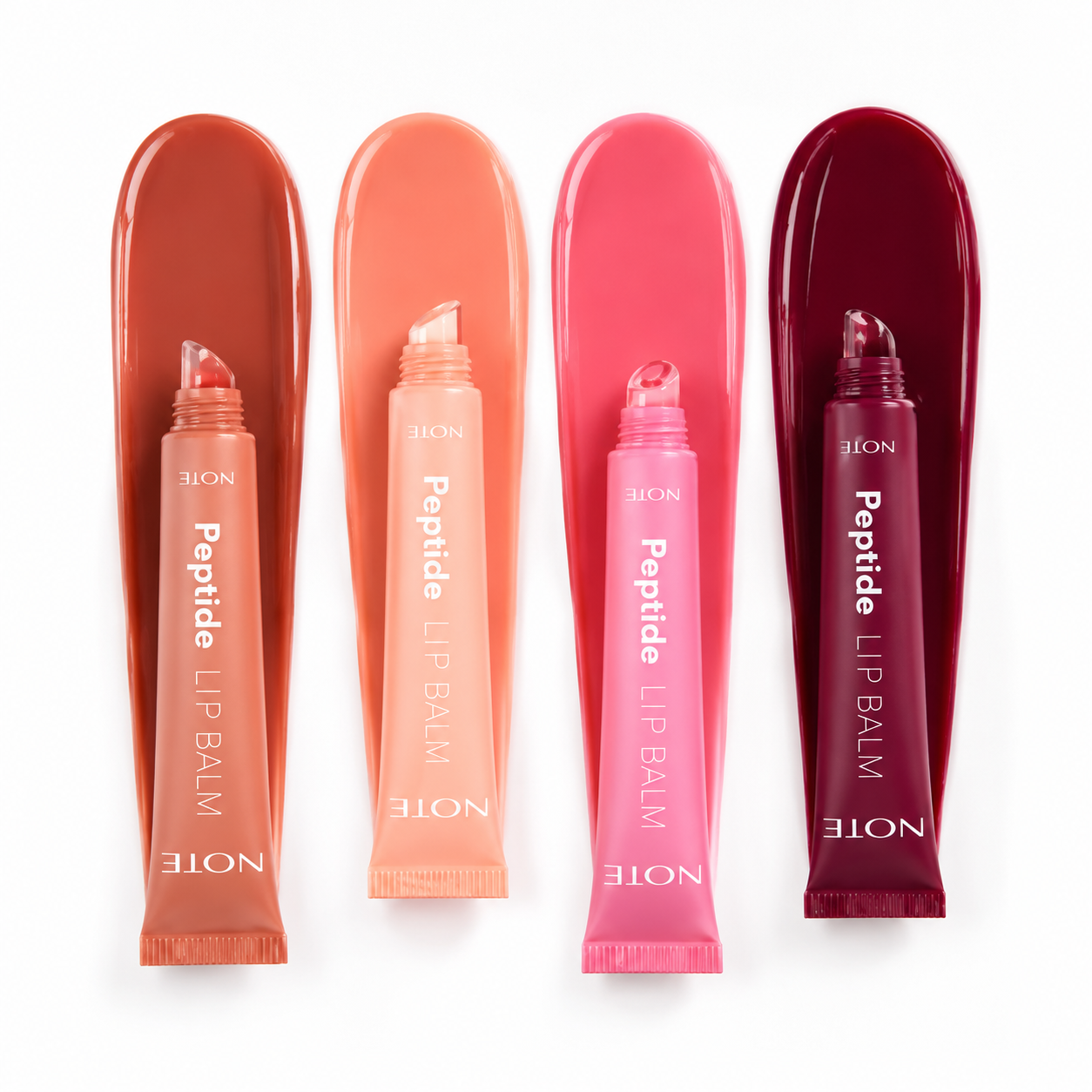 Peptide lip balm in four tinted shades by NOTE, glossy tubes with clear caps, arranged side by side on white background