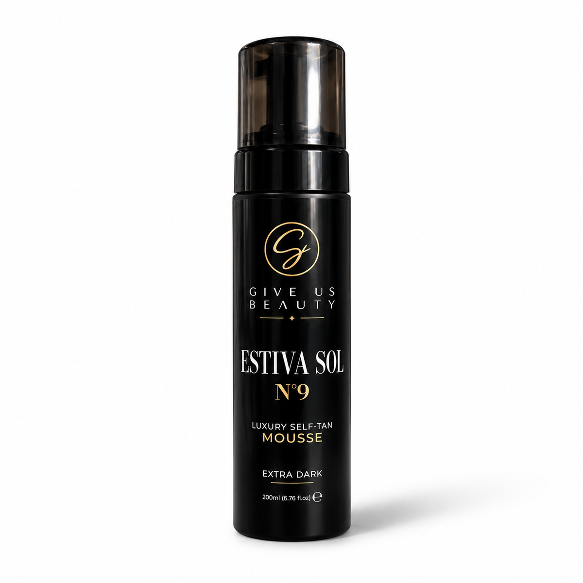 A black cylindrical pump bottle of Give Us Beauty Estiva Sol No. 9 Luxury Self-Tan Mousse, shown on a clean white background with a soft shadow.