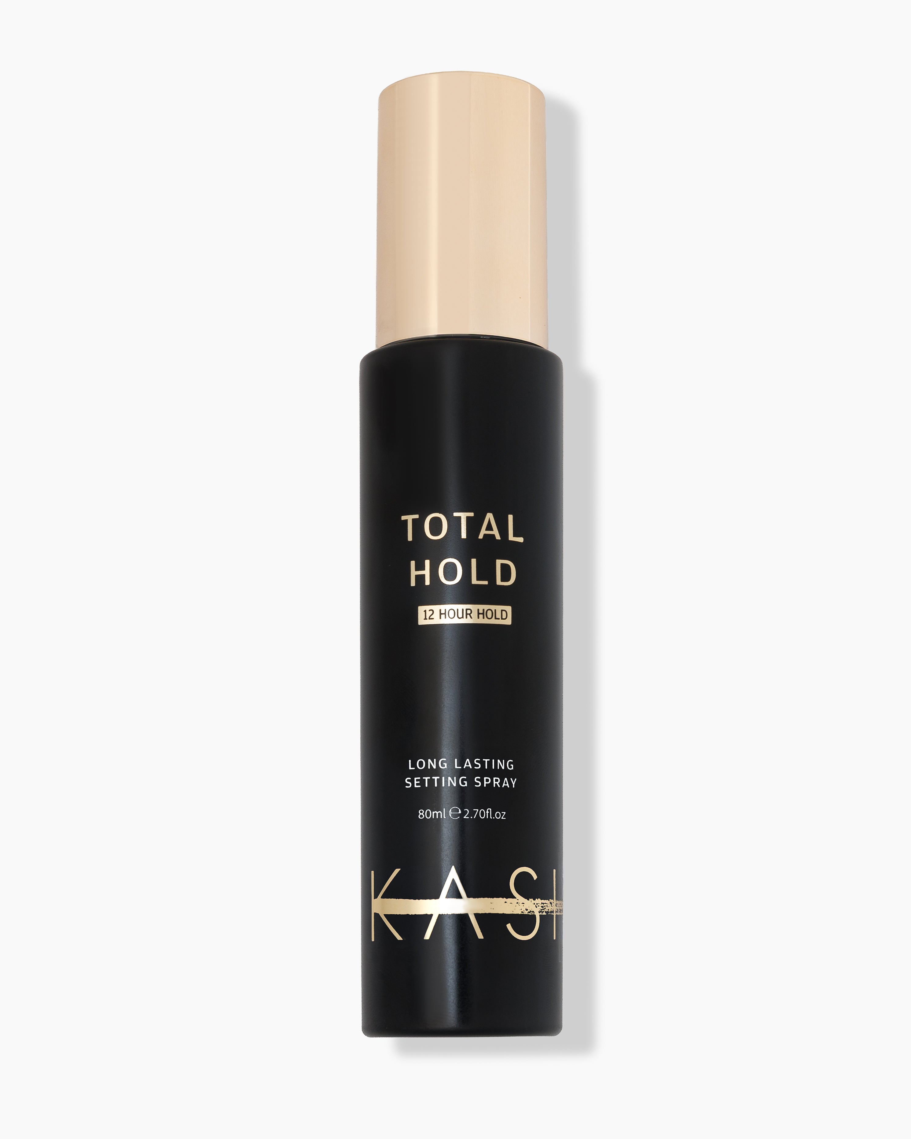Black matte setting spray bottle with gold cap and text, by KASH, featuring "Total Hold" and 12-hour claim, front view.