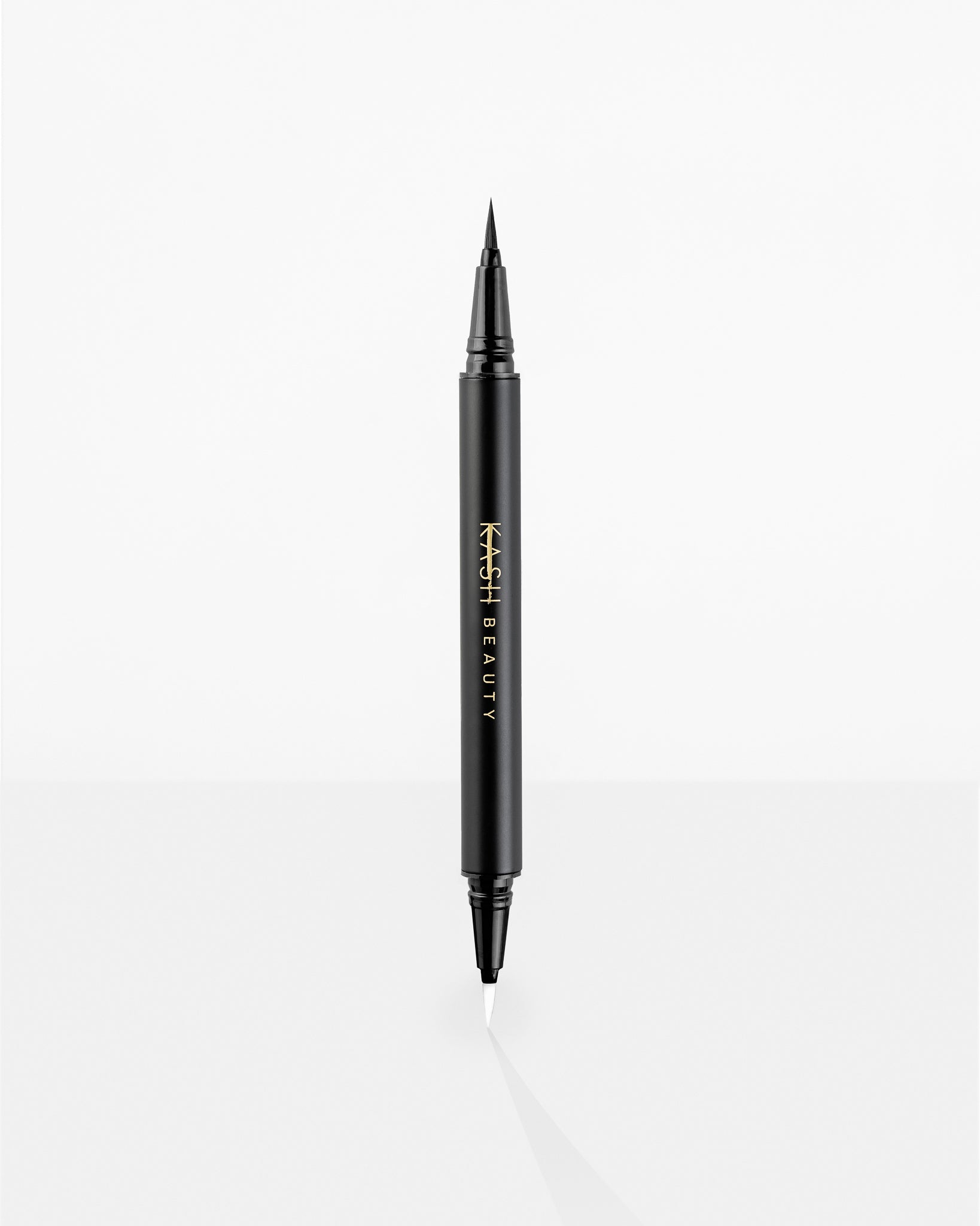 Black liquid eyeliner pen with fine tip and gold branding by Kash Beauty, shown upright on white background