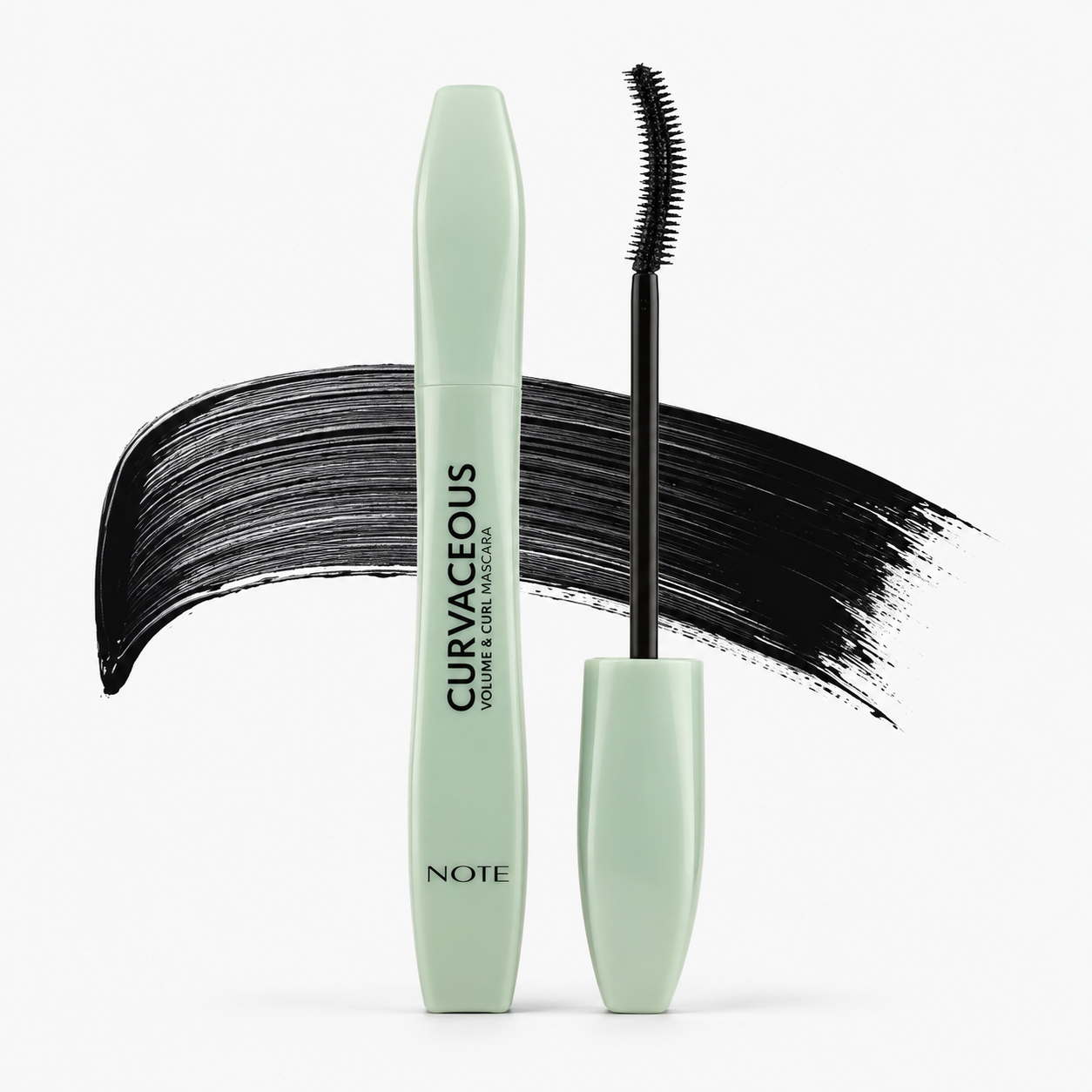 Curvaceous volume and curl mascara by NOTE in mint green tube with black wand and bold swatch behind
