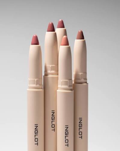 Set of Inglot lip pencils on a gray background