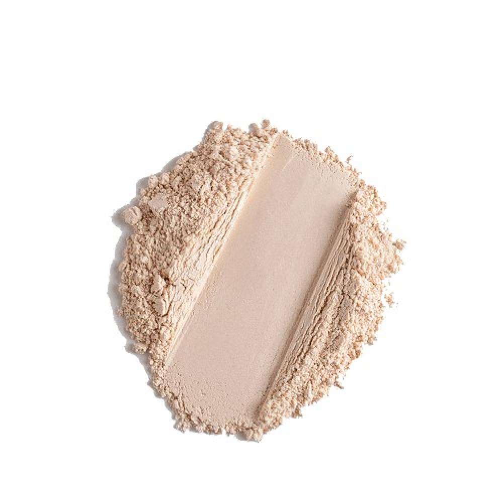 Light beige loose face powder by NOTE, finely milled with soft texture, top-down view on white background