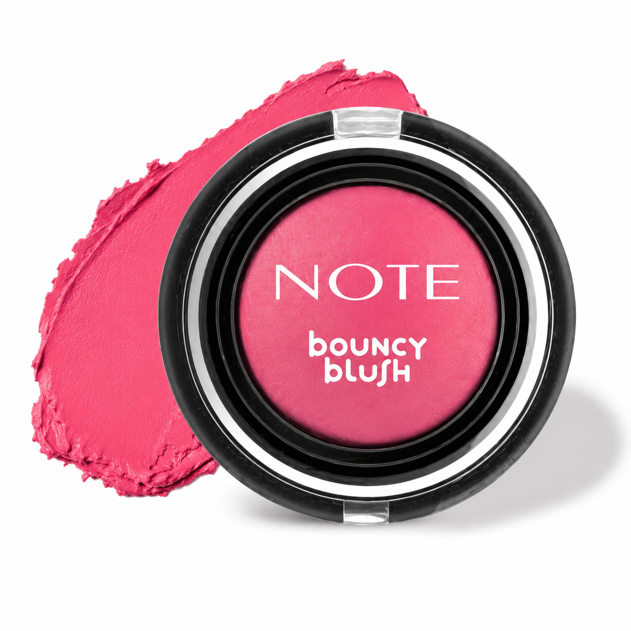Vibrant pink bouncy blush by NOTE in round black compact with silver trim and swatch beside, top view