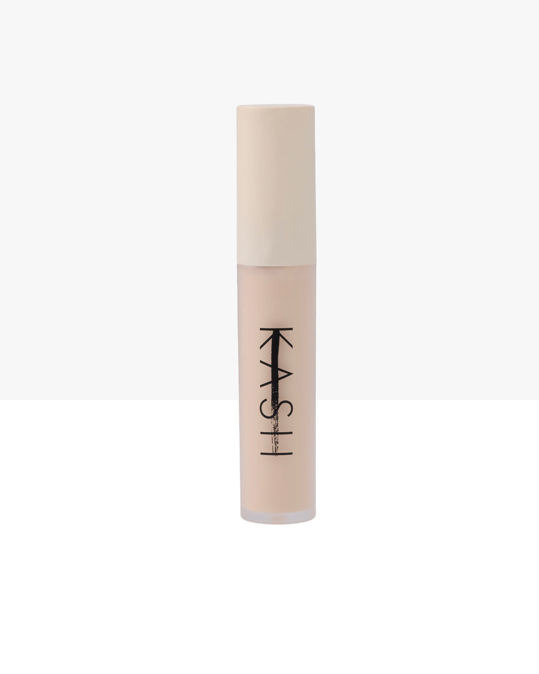 Light beige concealer tube by KASH with minimalist black logo, sleek matte finish, front view on white background