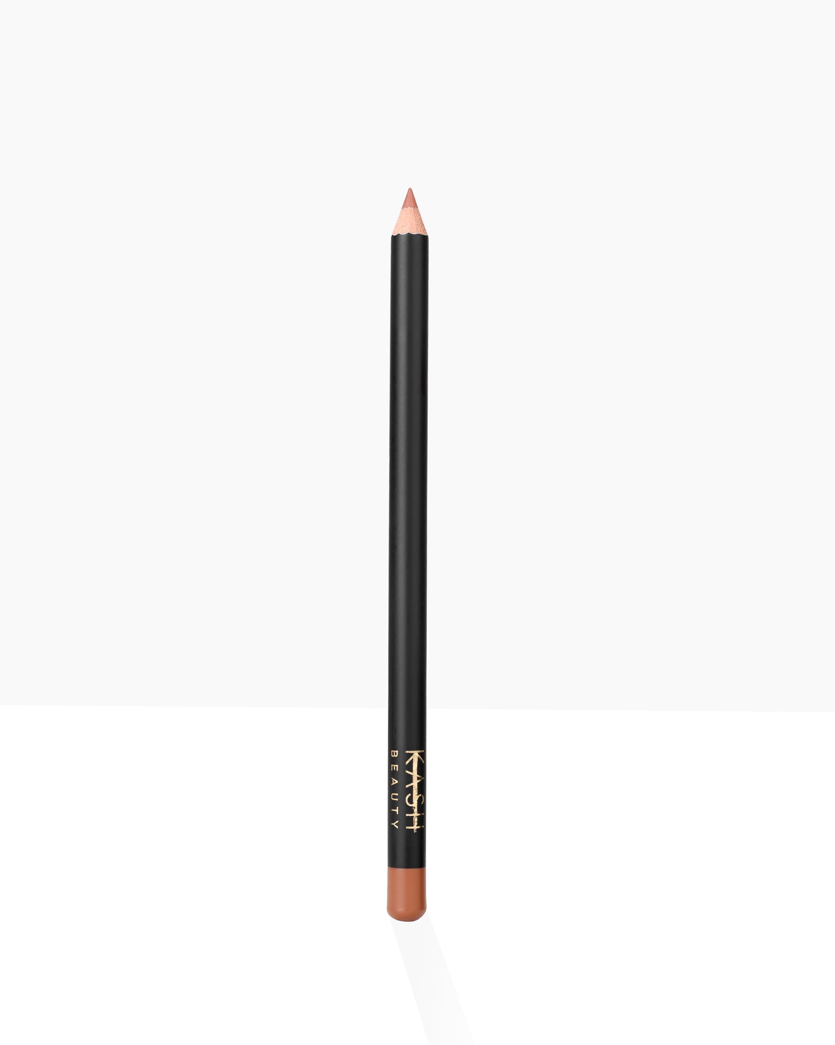 Nude-toned lip liner pencil with black barrel and gold branding by KASH Beauty, shown upright on white background