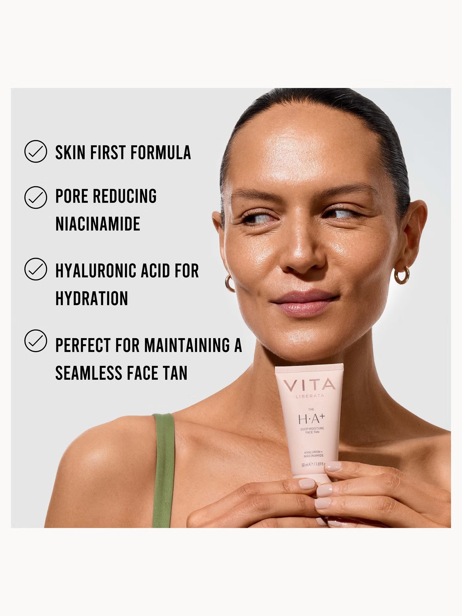 Woman holding a skincare product with text about its benefits on a light gray background