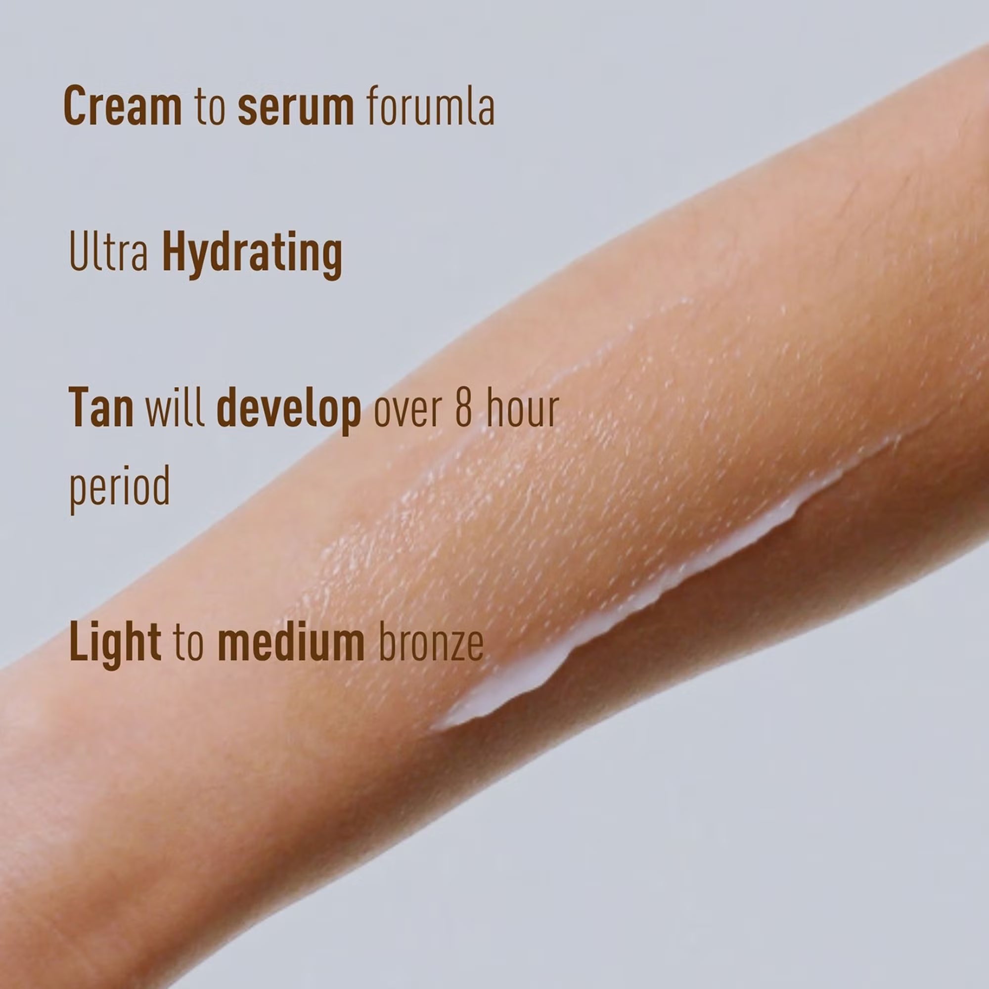 Arm with tan cream application and text about product features on a light gray background