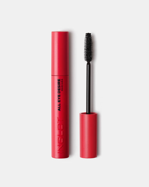 Red mascara with black brush on a white background all eye desire inglot and give us beauty