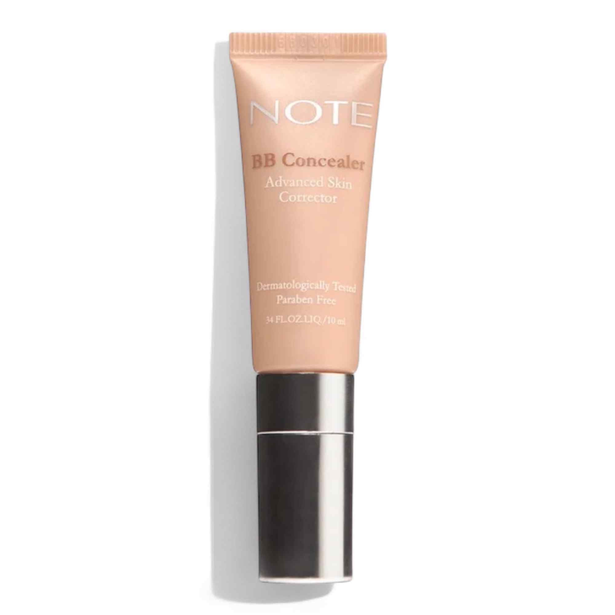 Nude BB concealer by Note Cosmetics with silver and black cap, front view on white background