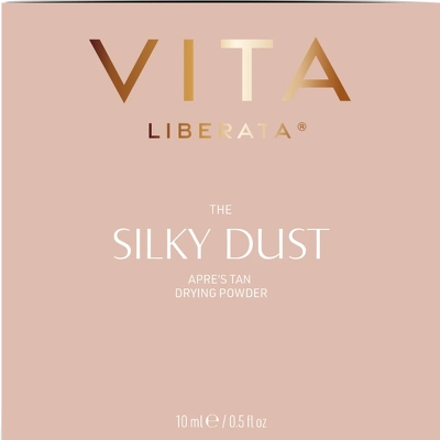 Vita Liberata Silky Dust powder packaging on a pink background