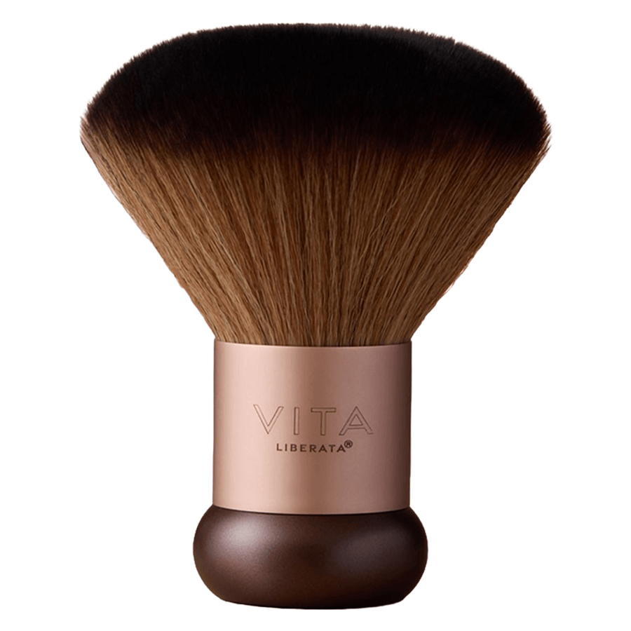 Makeup brush with brown bristles and rose gold handle on a white background